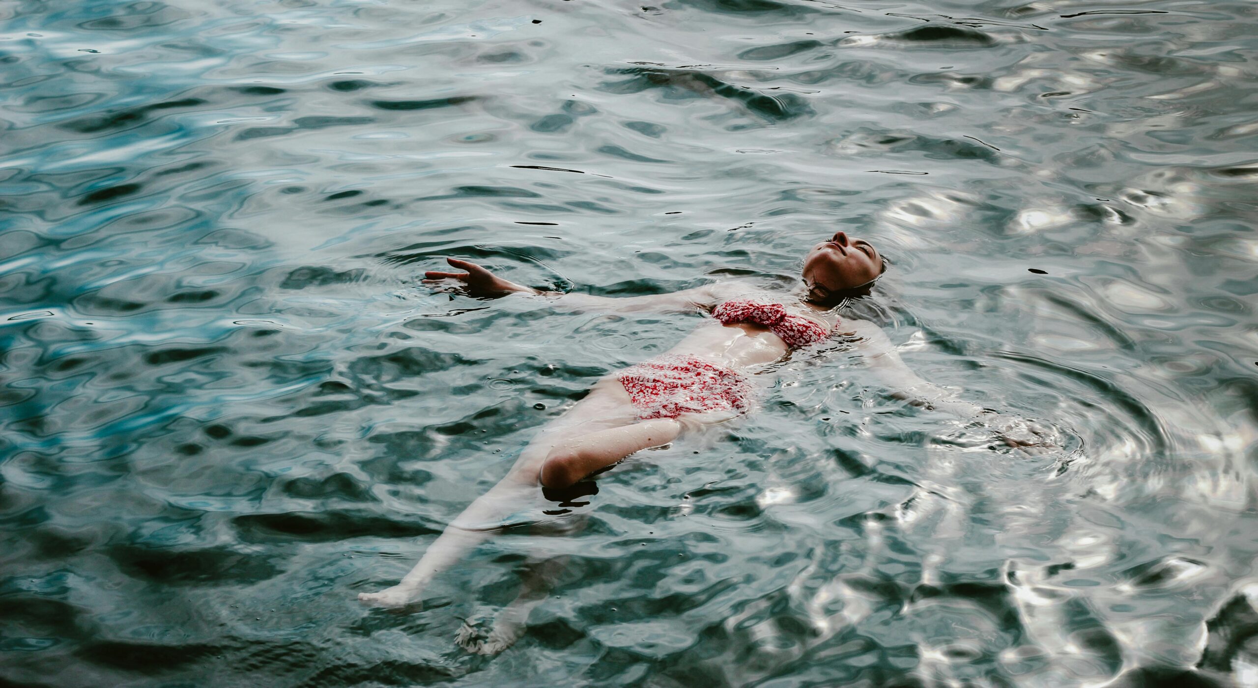 free photo of a woman swimming in a lake 1 scaled